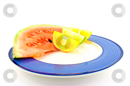 To use this stock image in your creative project, please select the size you need over to the right and click the "Add to Cart" button.
Your downloaded image will come with the Cutcaster watermark removed so don’t worry about the watermark you see on this page. Watermelon with Citrus Wedges stock photo, Slice of juicy red watermelon with lemon, lime and orange wedges on a blue plate with a white background by Keith Wilson