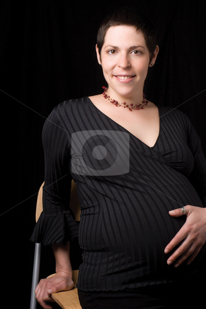 To use this stock image in your creative project, please select the size you need over to the right and click the "Add to Cart" button.
Your downloaded image will come with the Cutcaster watermark removed so don’t worry about the watermark you see on this page. Pregnant women stock photo, Sitting portrait of a late twenty pregnant women looking at the camera with a great big smile by Yann Poirier