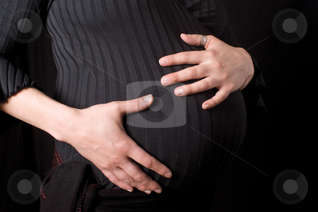 To use this stock image in your creative project, please select the size you need over to the right and click the "Add to Cart" button.
Your downloaded image will come with the Cutcaster watermark removed so don’t worry about the watermark you see on this page. Pregnant belly stock photo, Close of a pregnant belly being hold by Yann Poirier