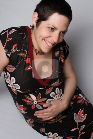 To use this stock image in your creative project, please select the size you need over to the right and click the "Add to Cart" button.
Your downloaded image will come with the Cutcaster watermark removed so don’t worry about the watermark you see on this page. Pregnant women stock photo, Sitting portrait of a late twenty pregnant women with shy by Yann Poirier