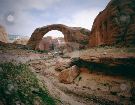To use this stock image in your creative project, please select the size you need over to the right and click the "Add to Cart" button.
Your downloaded image will come with the Cutcaster watermark removed so don’t worry about the watermark you see on this page. Rainbow Bridge Natural Arch, Lake Powell, Page, Arizona stock photo, Rainbow Bridge Natural Arch, Lake Powell, Page, Arizona.
Great for nature, wilderness, adventure, exploration, travel, backcountry and outdoor recreation themes. 16bit / 100mg scans from 4x5 transparency. by Jeff DeMent