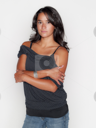 To use this stock image in your creative project, please select the size you need over to the right and click the "Add to Cart" button.
Your downloaded image will come with the Cutcaster watermark removed so don’t worry about the watermark you see on this page. Arms crossed stock photo, Pretty native american woman on white, no isolation, arms crossed by Cora Reed