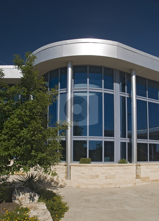 To use this stock image in your creative project, please select the size you need over to the right and click the "Add to Cart" button.
Your downloaded image will come with the Cutcaster watermark removed so don’t worry about the watermark you see on this page. Blue Glass and Sky stock photo, Curved design of blue glass on the exterior angle. by Charles Buegeler