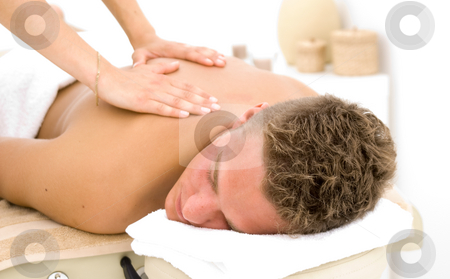 To use this stock image in your creative project, please select the size you need over to the right and click the "Add to Cart" button.
Your downloaded image will come with the Cutcaster watermark removed so don’t worry about the watermark you see on this page. Young man getting a massage stock photo, Young man in a spa getting a massage by Karin Claus
