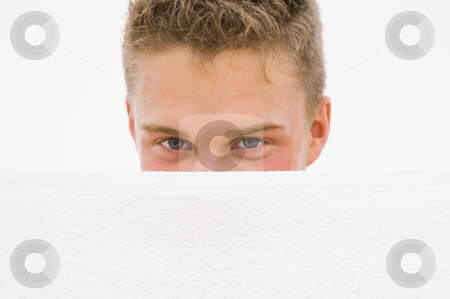 To use this stock image in your creative project, please select the size you need over to the right and click the "Add to Cart" button.
Your downloaded image will come with the Cutcaster watermark removed so don’t worry about the watermark you see on this page. Young man hiding stock photo, Young man hiding himself behind a white towel by Karin Claus