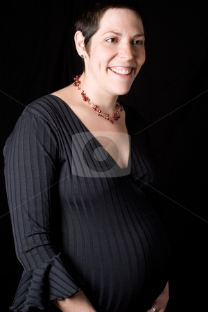To use this stock image in your creative project, please select the size you need over to the right and click the "Add to Cart" button.
Your downloaded image will come with the Cutcaster watermark removed so don’t worry about the watermark you see on this page. Pregnant Women stock photo, Portrait of a late twenty pregnant women looking perky with a great big smile by Yann Poirier