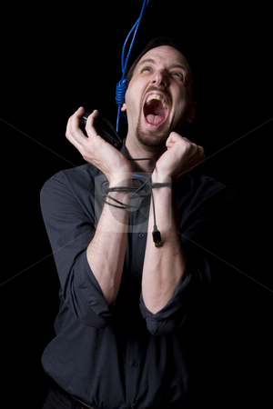 To use this stock image in your creative project, please select the size you need over to the right and click the "Add to Cart" button.
Your downloaded image will come with the Cutcaster watermark removed so don’t worry about the watermark you see on this page. Screaming at the heaven stock photo, Computer technician, hand tied with a mouse and a hangman noeuce made of network cable, screaming at the heaven by Yann Poirier
