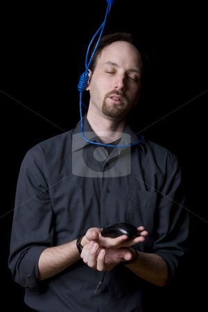 To use this stock image in your creative project, please select the size you need over to the right and click the "Add to Cart" button.
Your downloaded image will come with the Cutcaster watermark removed so don’t worry about the watermark you see on this page. Suicidal technician Peaceful stock photo, Computer technician with tied hands and hangman noeuce around his neck, accepting his faith and closing his eyes by Yann Poirier