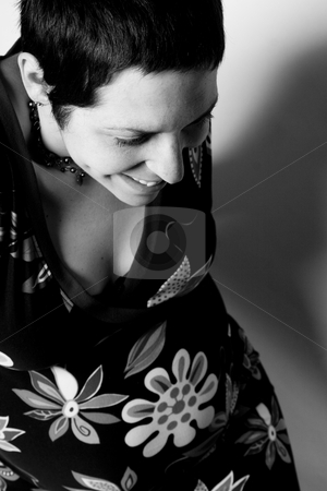 To use this stock image in your creative project, please select the size you need over to the right and click the "Add to Cart" button.
Your downloaded image will come with the Cutcaster watermark removed so don’t worry about the watermark you see on this page. Boyish pregnant women loundging stock photo, Late twenties pregnant women with boyish look on white seamless sitting on ground level by Yann Poirier