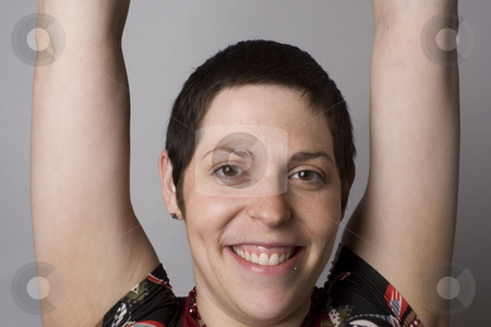 To use this stock image in your creative project, please select the size you need over to the right and click the "Add to Cart" button.
Your downloaded image will come with the Cutcaster watermark removed so don’t worry about the watermark you see on this page. Reaching for the sky stock photo, Twenty something women with her arm stretch out by Yann Poirier