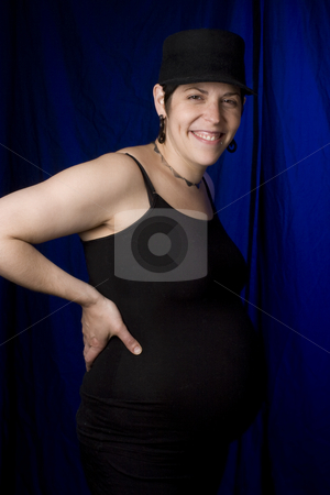 To use this stock image in your creative project, please select the size you need over to the right and click the "Add to Cart" button.
Your downloaded image will come with the Cutcaster watermark removed so don’t worry about the watermark you see on this page. Boyish pregnant women stock photo, Twenty something pregnant women with boyish look by Yann Poirier