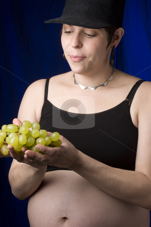 To use this stock image in your creative project, please select the size you need over to the right and click the "Add to Cart" button.
Your downloaded image will come with the Cutcaster watermark removed so don’t worry about the watermark you see on this page. Choosing grapes stock photo, Pregnant women choosing green grapes by Yann Poirier