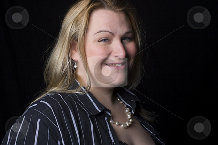 To use this stock image in your creative project, please select the size you need over to the right and click the "Add to Cart" button.
Your downloaded image will come with the Cutcaster watermark removed so don’t worry about the watermark you see on this page. Overweight fashion model stock photo, Thirty something overweight fashion model in sexy black outfit with a big smile by Yann Poirier
