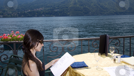 To use this stock image in your creative project, please select the size you need over to the right and click the "Add to Cart" button.
Your downloaded image will come with the Cutcaster watermark removed so don’t worry about the watermark you see on this page. Looking at the menu stock photo, Looking at the menu at an outside restaurant in Como Italy by Daniel Kafer