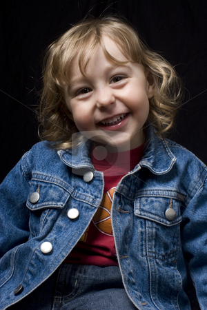 To use this stock image in your creative project, please select the size you need over to the right and click the "Add to Cart" button.
Your downloaded image will come with the Cutcaster watermark removed so don’t worry about the watermark you see on this page. Toddler smiling stock photo, Portrait of a two year old boy wearing a jean jacket with great big smile by Yann Poirier