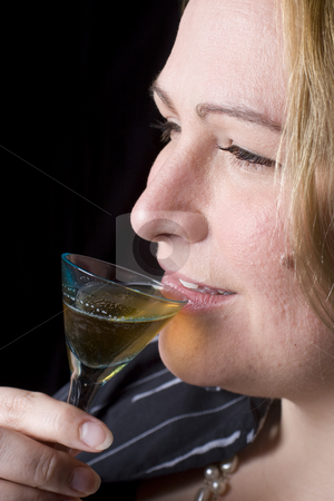 To use this stock image in your creative project, please select the size you need over to the right and click the "Add to Cart" button.
Your downloaded image will come with the Cutcaster watermark removed so don’t worry about the watermark you see on this page. Overweight women having a drink stock photo, Portrait of a thirty something overweight women in evening clothes having a drink of brown rum by Yann Poirier