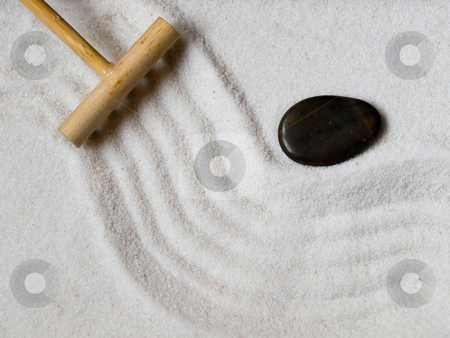 To use this stock image in your creative project, please select the size you need over to the right and click the "Add to Cart" button.
Your downloaded image will come with the Cutcaster watermark removed so don’t worry about the watermark you see on this page. Japanese zen garden stock photo, Close-up of a a Japanese zen garden with a wooden rake and a black stone. by FEL Yannick