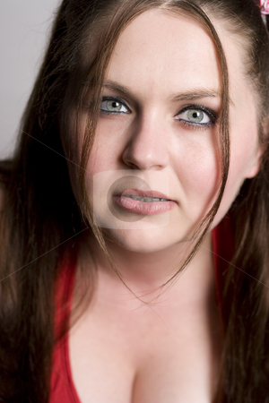 To use this stock image in your creative project, please select the size you need over to the right and click the "Add to Cart" button.
Your downloaded image will come with the Cutcaster watermark removed so don’t worry about the watermark you see on this page. Growling stock photo, Twenty something girl in red binikin with growling expression by Yann Poirier
