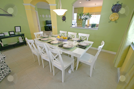 To use this stock image in your creative project, please select the size you need over to the right and click the "Add to Cart" button.
Your downloaded image will come with the Cutcaster watermark removed so don’t worry about the watermark you see on this page. Dining Room stock photo, A Dining Room in a House in Florida. by Lucy Clark