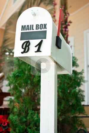 To use this stock image in your creative project, please select the size you need over to the right and click the "Add to Cart" button.
Your downloaded image will come with the Cutcaster watermark removed so don’t worry about the watermark you see on this page. Mailbox stock photo, White decorative mailbox standing at the house by Dmitry Rostovtsev