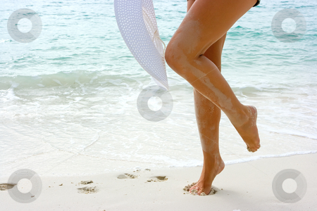 To use this stock image in your creative project, please select the size you need over to the right and click the "Add to Cart" button.
Your downloaded image will come with the Cutcaster watermark removed so don’t worry about the watermark you see on this page. Woman with white hat on the beach stock photo, White hat in hands of a young lady on the beach by Dmitry Rostovtsev