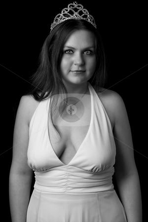 To use this stock image in your creative project, please select the size you need over to the right and click the "Add to Cart" button.
Your downloaded image will come with the Cutcaster watermark removed so don’t worry about the watermark you see on this page. Prom queen stock photo, Prom queen in yellow evening dress with v shape cleavage line by Yann Poirier