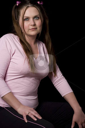 To use this stock image in your creative project, please select the size you need over to the right and click the "Add to Cart" button.
Your downloaded image will come with the Cutcaster watermark removed so don’t worry about the watermark you see on this page. Girl in pink shirt stock photo, Chubby girl in pink shirt by Yann Poirier