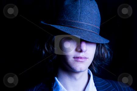 To use this stock image in your creative project, please select the size you need over to the right and click the "Add to Cart" button.
Your downloaded image will come with the Cutcaster watermark removed so don’t worry about the watermark you see on this page. Teen with hat stock photo, Male teenager with a hat tipped over the eyes by Yann Poirier