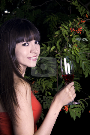 To use this stock image in your creative project, please select the size you need over to the right and click the "Add to Cart" button.
Your downloaded image will come with the Cutcaster watermark removed so don’t worry about the watermark you see on this page. Woman outside with red drink stock photo, Latina woman outside with green plants in the background with a red drink and a red drink by Daniel Kafer