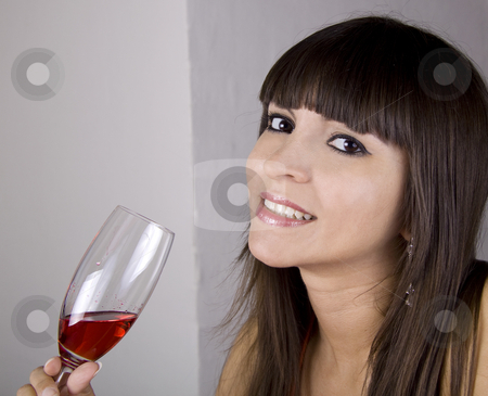 To use this stock image in your creative project, please select the size you need over to the right and click the "Add to Cart" button.
Your downloaded image will come with the Cutcaster watermark removed so don’t worry about the watermark you see on this page. Young woman with red drink stock photo, Brazilian brunette female with a red drink in her hand by Daniel Kafer