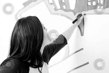 To use this stock image in your creative project, please select the size you need over to the right and click the "Add to Cart" button.
Your downloaded image will come with the Cutcaster watermark removed so don’t worry about the watermark you see on this page. Doing a graffiti stock photo, Teen girl drawing a graffiti on a wall by Yann Poirier