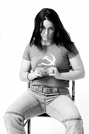 To use this stock image in your creative project, please select the size you need over to the right and click the "Add to Cart" button.
Your downloaded image will come with the Cutcaster watermark removed so don’t worry about the watermark you see on this page. Evil women stock photo, Evil looking young woman by Yann Poirier