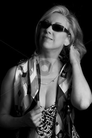 To use this stock image in your creative project, please select the size you need over to the right and click the "Add to Cart" button.
Your downloaded image will come with the Cutcaster watermark removed so don’t worry about the watermark you see on this page. Placing her hair stock photo, Women in her early fifties with classic Audrey Hepburn replacing her hair by Yann Poirier