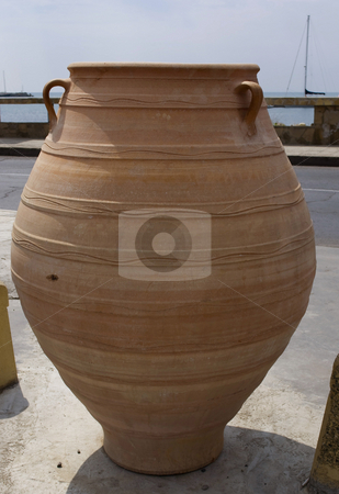 To use this stock image in your creative project, please select the size you need over to the right and click the "Add to Cart" button.
Your downloaded image will come with the Cutcaster watermark removed so don’t worry about the watermark you see on this page. Clay pot stock photo, Big clay pot in ancient city by Desislava Dimitrova