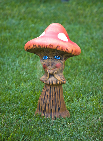 To use this stock image in your creative project, please select the size you need over to the right and click the "Add to Cart" button.
Your downloaded image will come with the Cutcaster watermark removed so don’t worry about the watermark you see on this page. Garden decorative statue stock photo, Little mushroom garden decorative statue on green grass by Desislava Dimitrova