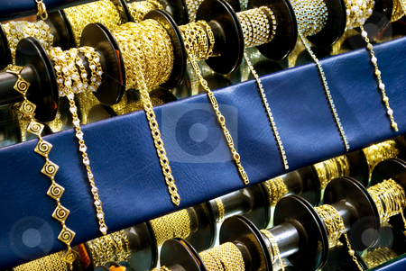 To use this stock image in your creative project, please select the size you need over to the right and click the "Add to Cart" button.
Your downloaded image will come with the Cutcaster watermark removed so don’t worry about the watermark you see on this page. Golden chain stock photo, Golden chains for necklaces and bracelets jewelry by Desislava Dimitrova