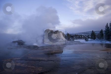 To use this stock image in your creative project, please select the size you need over to the right and click the "Add to Cart" button.
Your downloaded image will come with the Cutcaster watermark removed so don’t worry about the watermark you see on this page. Castle Geyser in Yellowstone National Park stock photo, Evening shot of Castle Geyser with the moon behind the stream vent by Sharron Schiefelbein