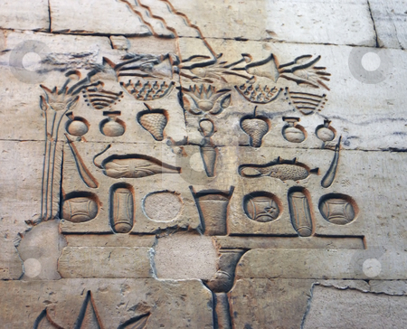 To use this stock image in your creative project, please select the size you need over to the right and click the "Add to Cart" button.
Your downloaded image will come with the Cutcaster watermark removed so don’t worry about the watermark you see on this page. 185 Wall of relief of food eating in Egypt stock photo, Hieroglyphics of food the Egyptians grow and eat. by Sharron Schiefelbein