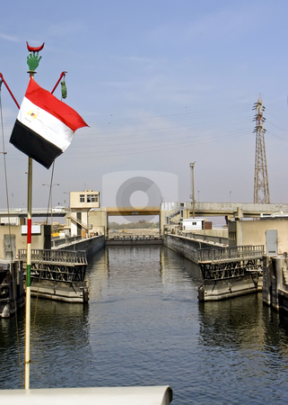 To use this stock image in your creative project, please select the size you need over to the right and click the "Add to Cart" button.
Your downloaded image will come with the Cutcaster watermark removed so don’t worry about the watermark you see on this page. 201 Lock system on the Nile River stock photo, Lock system on the Nile River in Egypt by Sharron Schiefelbein