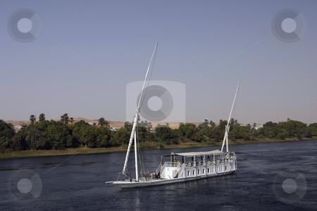 To use this stock image in your creative project, please select the size you need over to the right and click the "Add to Cart" button.
Your downloaded image will come with the Cutcaster watermark removed so don’t worry about the watermark you see on this page. Boat on the Nile stock photo, Boat going to Luxor on the Nile River in Egypt by Sharron Schiefelbein