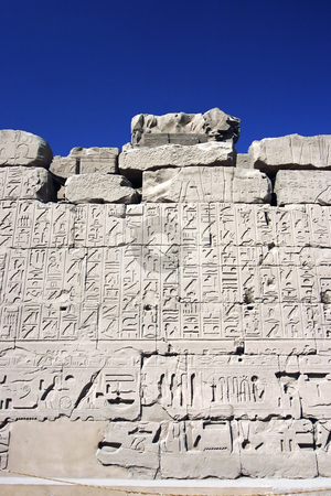 To use this stock image in your creative project, please select the size you need over to the right and click the "Add to Cart" button.
Your downloaded image will come with the Cutcaster watermark removed so don’t worry about the watermark you see on this page. 186 Wall of relief in Egypt stock photo, Hieroglyphics in Egypt by Sharron Schiefelbein
