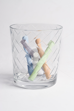 To use this stock image in your creative project, please select the size you need over to the right and click the "Add to Cart" button.
Your downloaded image will come with the Cutcaster watermark removed so don’t worry about the watermark you see on this page. Glass of chalk stock photo, Etch glass containing colored chalk by Yann Poirier