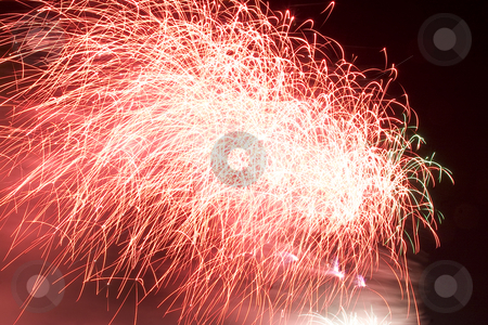 To use this stock image in your creative project, please select the size you need over to the right and click the "Add to Cart" button.
Your downloaded image will come with the Cutcaster watermark removed so don’t worry about the watermark you see on this page. Firework stock photo, Red firework display trailing in the wind by Yann Poirier