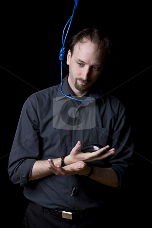 To use this stock image in your creative project, please select the size you need over to the right and click the "Add to Cart" button.
Your downloaded image will come with the Cutcaster watermark removed so don’t worry about the watermark you see on this page. SUICIDAL TECHNICIAN stock photo, Computer technician with tied hands and hangman noeuce done with network blue cable around his neck by Yann Poirier