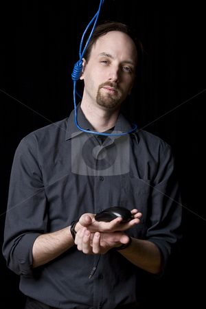 To use this stock image in your creative project, please select the size you need over to the right and click the "Add to Cart" button.
Your downloaded image will come with the Cutcaster watermark removed so don’t worry about the watermark you see on this page. SUICIDAL TECHNICIAN stock photo, Computer technician with tied hands and hangman noeuce done with network blue cable around his neck by Yann Poirier