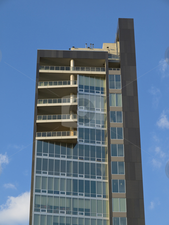 To use this stock image in your creative project, please select the size you need over to the right and click the "Add to Cart" button.
Your downloaded image will come with the Cutcaster watermark removed so don’t worry about the watermark you see on this page. West side New York building stock photo, Modern west side loft building on blue sky background. by Ignacio Gonzalez Prado