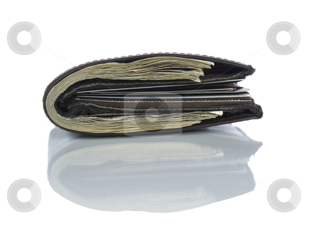 To use this stock image in your creative project, please select the size you need over to the right and click the "Add to Cart" button.
Your downloaded image will come with the Cutcaster watermark removed so don’t worry about the watermark you see on this page. Wallet full of dollars stock photo, A leather wallet full of dollars isolated on white. by Ignacio Gonzalez Prado