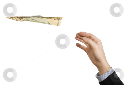 To use this stock image in your creative project, please select the size you need over to the right and click the "Add to Cart" button.
Your downloaded image will come with the Cutcaster watermark removed so don’t worry about the watermark you see on this page. Fly away stock photo, A man's hand throwing a paper plane made of a ten dollar bill. by Ignacio Gonzalez Prado