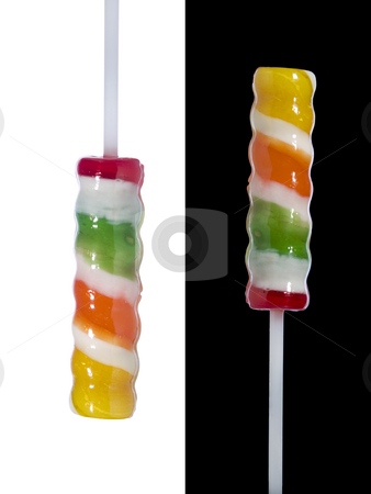 To use this stock image in your creative project, please select the size you need over to the right and click the "Add to Cart" button.
Your downloaded image will come with the Cutcaster watermark removed so don’t worry about the watermark you see on this page. Lollipop stock photo, Two lollipop sticks pointing in opposite directions over black and white backgrounds respectively by Ignacio Gonzalez Prado