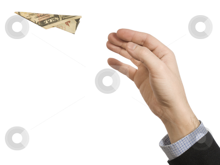 To use this stock image in your creative project, please select the size you need over to the right and click the "Add to Cart" button.
Your downloaded image will come with the Cutcaster watermark removed so don’t worry about the watermark you see on this page. Fly away stock photo, A man's hand throwing a paper plane made of a ten dollar bill. by Ignacio Gonzalez Prado